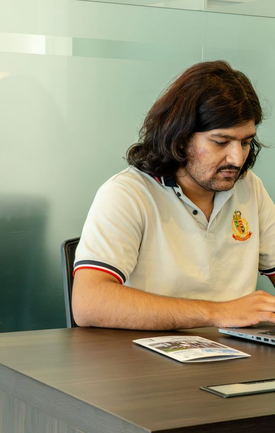 A counsellor working at the meeting table